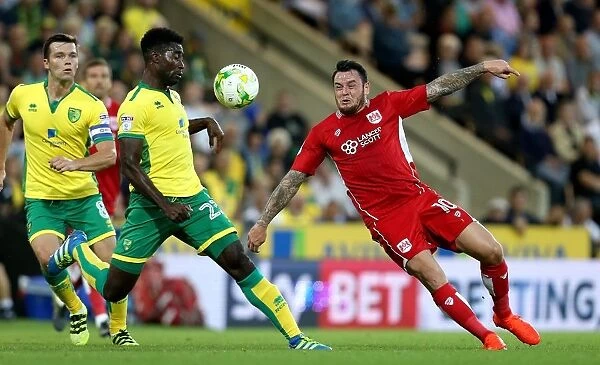 Bristol City's Lee Tomlin Outmaneuvers Norwich City's Harry Toffolo during Sky Bet Championship Match