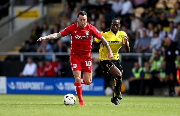 Bristol City's Lee Tomlin Outruns Burton Albion's Lucas Akins during Sky Bet Championship Match