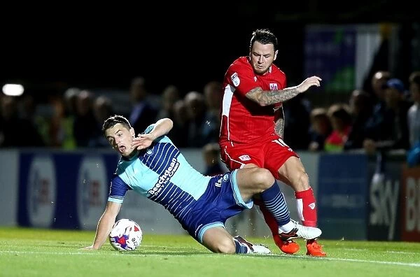 Bristol City's Lee Tomlin Tackled by Wycombe Wanderers Stephen McGinn in EFL League Cup Clash