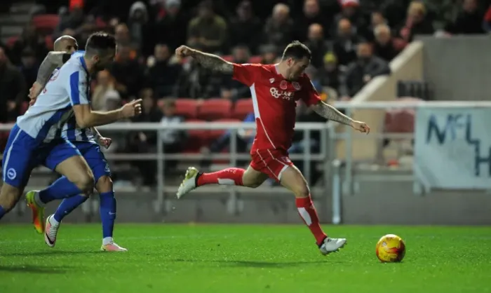 Framed Print : Bristol City's Lee Tomlin Takes Shot Against Brighton & Hove Albion in Sky Bet Championship Match Framed Print : Bristol City's Lee Tomlin Takes Shot Against Brighton & Hove Albion in Sky Bet Championship Match