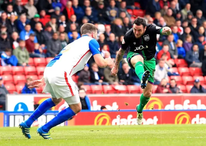 Framed Print : Bristol City's Lee Tomlin Unleashes a Shot at Blackburn Rovers in Championship Clash