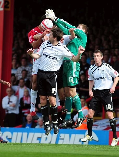 Bristol City's Lewin Nyatanga Contests Aerial Ball against Derby County's Saul Deeney and Shaun Barker - Championship Clash, April 2010