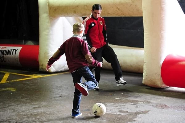 Bristol City's Lewis Carey Interacts with Young Fans at Community Park Before Championship Match