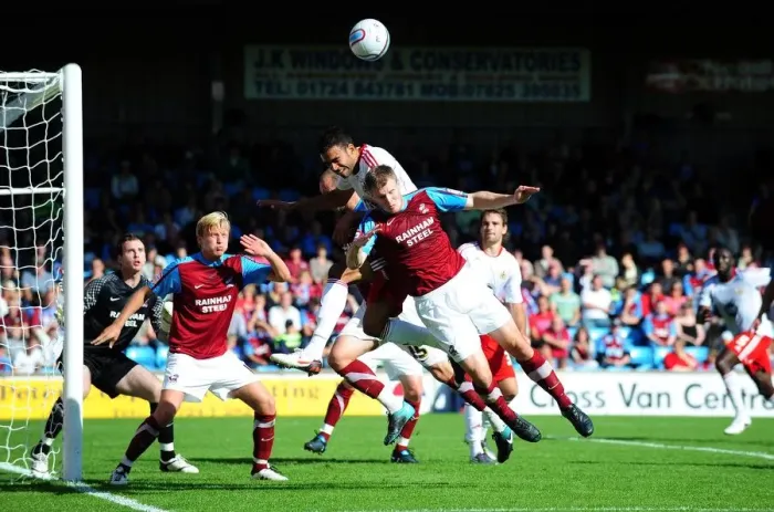 Framed Print : Bristol City's Liam Fontaine Battles for Aerial Ball Against Scunthorpe's Michael O'Connor - Championship Clash, September 11, 2010 Framed Print : Bristol City's Liam Fontaine Battles for Aerial Ball Against Scunthorpe's Michael O'Connor - Championship Clash, September 11, 2010