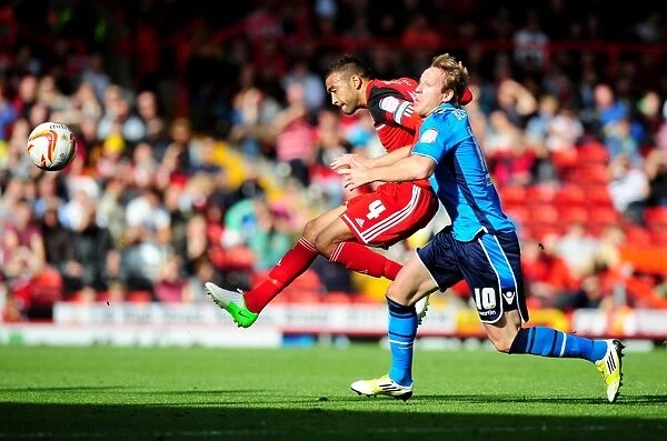 Bristol City's Liam Fontaine Blocks Shot from Leeds United's Luciano Becchio in Championship Match