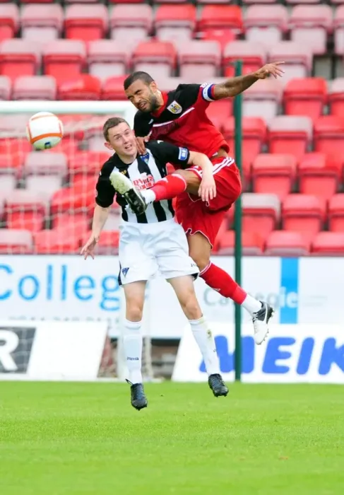 Framed Print : Bristol City's Liam Fontaine Fights for Ball Against Dunfermline's Paul Willis in Pre-Season Friendly Framed Print : Bristol City's Liam Fontaine Fights for Ball Against Dunfermline's Paul Willis in Pre-Season Friendly