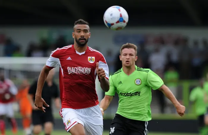 Framed Print : Bristol City's Liam Fontaine and Forest Green Rovers Matt Taylor Clash in Preseason Encounter
