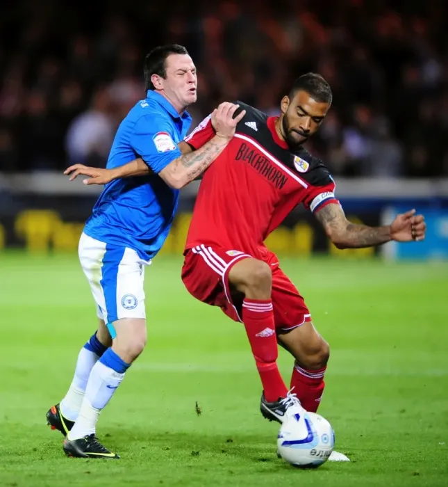 Framed Print : Bristol City's Liam Fontaine Fouled by Lee Tomlin in Peterborough United Match