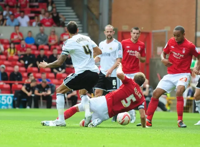 Framed Print : Bristol City's Liam Fontaine Fouls Called Back Against Nottingham Forest's Danny Collins (Nottingham Forest v Bristol City, Championship 2012)