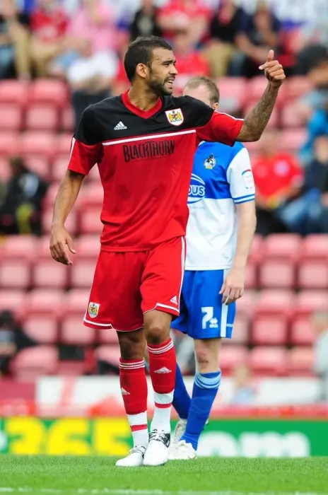 Framed Print : Bristol City's Liam Fontaine Leads the Charge at Louis Carey's Testimonial, Ashton Gate Stadium (August 4, 2012)