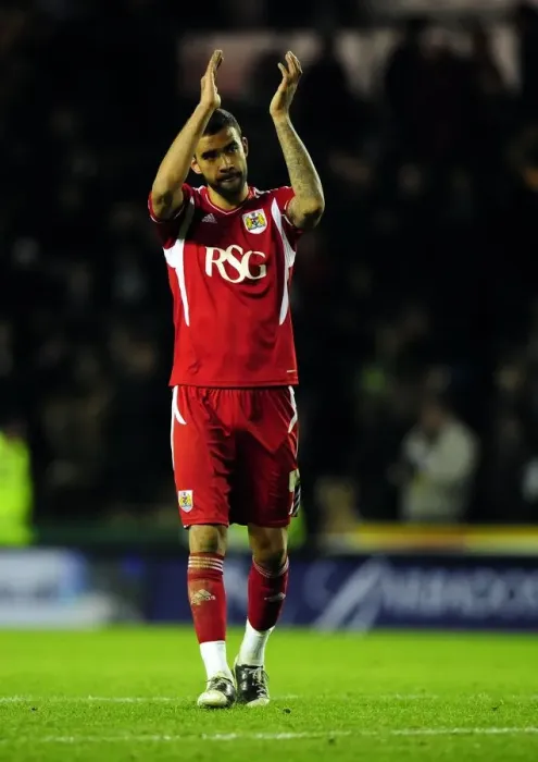 Framed Print : Bristol City's Liam Fontaine Shows Appreciation to Traveling Fans at Derby County Championship Match - 10 / 12 / 2011