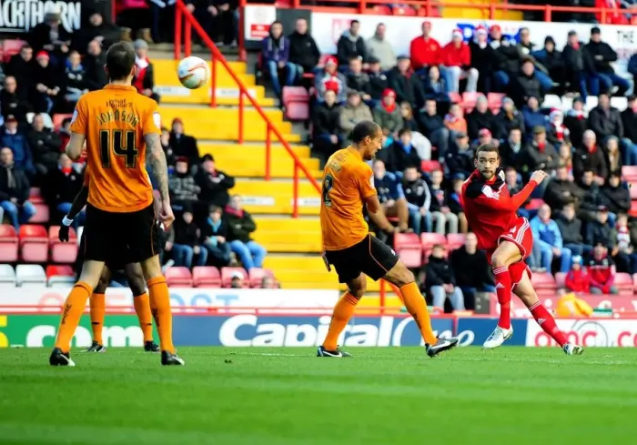 Framed Print : Bristol City's Liam Fontaine Unleashes a Powerful Volley Against Wolves in Championship Clash Framed Print : Bristol City's Liam Fontaine Unleashes a Powerful Volley Against Wolves in Championship Clash
