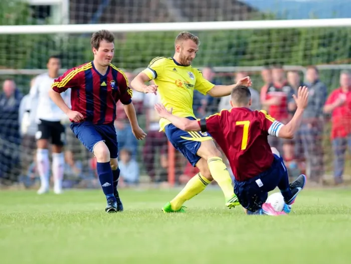 Framed Print : Bristol City's Liam Kelly Tackled in Pre-Season Friendly Against Ashton and Backwell United Framed Print : Bristol City's Liam Kelly Tackled in Pre-Season Friendly Against Ashton and Backwell United