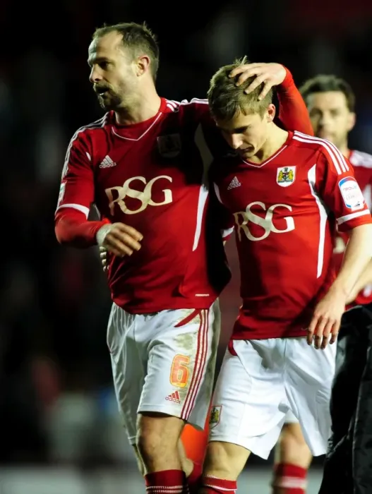 Framed Print : Bristol City's Louis Carey Congratulates Joe Bryan on Debut Against Leicester City