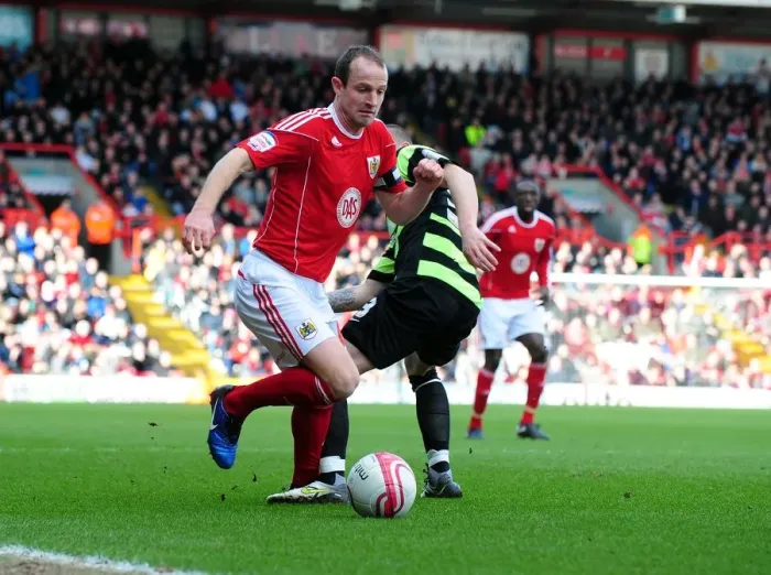 Framed Print : Bristol City's Louis Carey Outmaneuvers Joe Garner of Scunthorpe United in Championship Clash at Ashton Gate Stadium (February 2010)