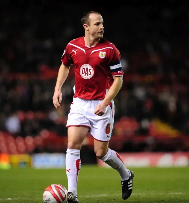 Framed Print : Bristol City's Louis Carey Rallies Team Against Barnsley in 2010 Championship Showdown at Ashton Gate Framed Print : Bristol City's Louis Carey Rallies Team Against Barnsley in 2010 Championship Showdown at Ashton Gate
