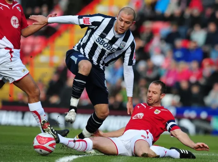 Framed Print : Bristol City's Louis Carey Tackles West Bromwich Albion's Roman Bednal - Football Championship Clash, 2010 Framed Print : Bristol City's Louis Carey Tackles West Bromwich Albion's Roman Bednal - Football Championship Clash, 2010
