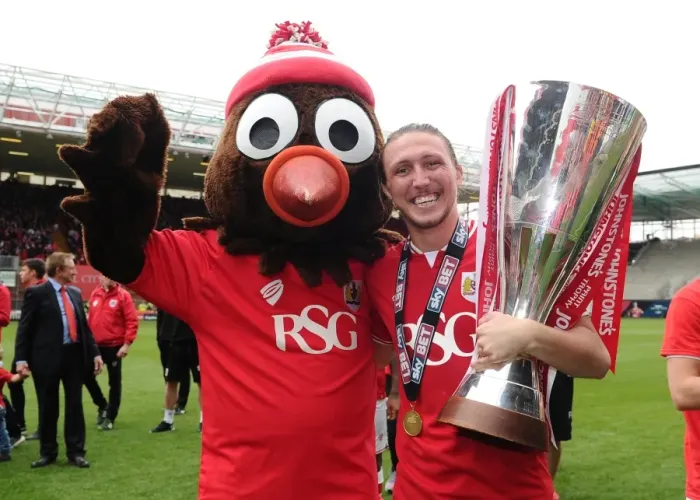 Framed Print : Bristol City's Luke Ayling Celebrates Double Victory with the League One and JPT Trophies Framed Print : Bristol City's Luke Ayling Celebrates Double Victory with the League One and JPT Trophies