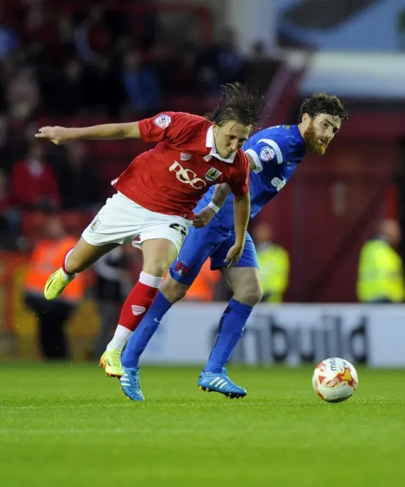 Framed Print : Bristol City's Luke Ayling Dodges Challenge from Leyton Orient's Romain Vincelot during Sky Bet League One Match