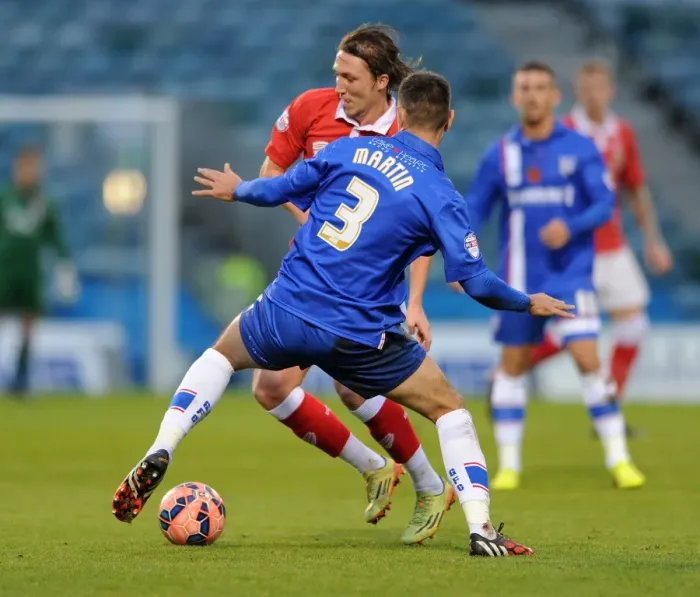 Framed Print : Bristol City's Luke Ayling Tackled by Joe Martin in FA Cup Clash at Gillingham's Priestfield Stadium Framed Print : Bristol City's Luke Ayling Tackled by Joe Martin in FA Cup Clash at Gillingham's Priestfield Stadium