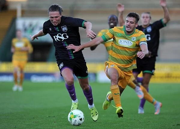 Bristol City's Luke Ayling Tackles Ryan Dickson of Yeovil Town in Pre-Season Match