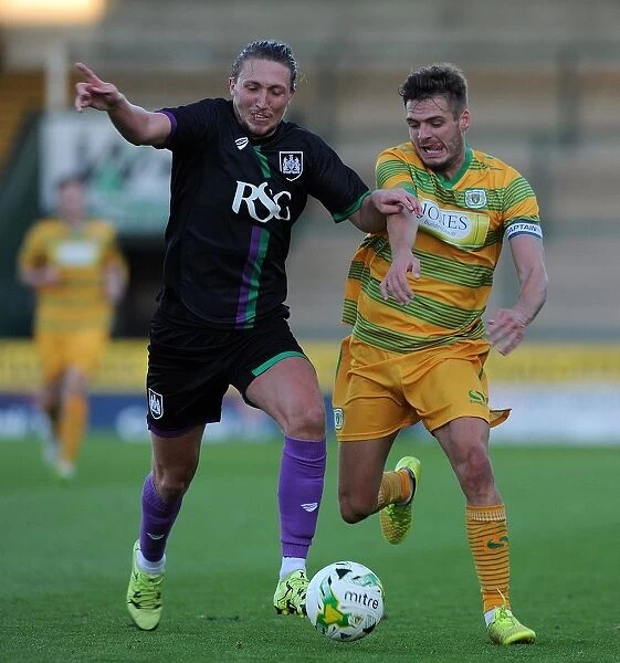 Bristol City's Luke Ayling Tackles Yeovil Town's Ryan Dickson in Pre-Season Clash