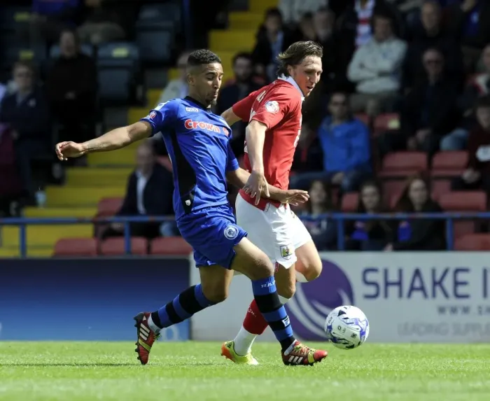 Framed Print : Bristol City's Luke Ayling vs Rochdale's Bastien Hery: Intense Battle for the Ball in Sky Bet League One Clash