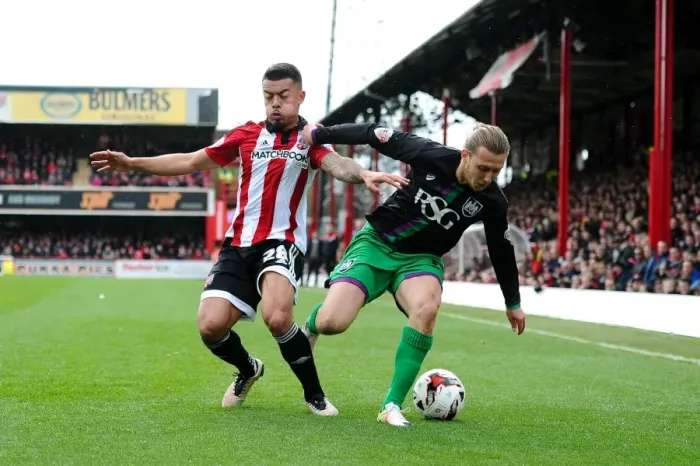 Framed Print : Bristol City's Luke Freeman Battles Nico Yennaris of Brentford in Championship Clash