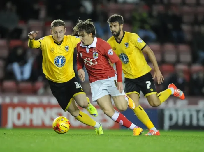 Framed Print : Bristol City's Luke Freeman Charges Forward in Johnstone's Paint Trophy Match Framed Print : Bristol City's Luke Freeman Charges Forward in Johnstone's Paint Trophy Match