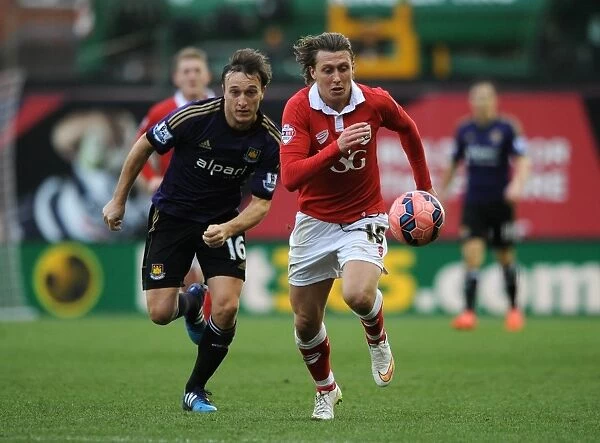 Bristol City's Luke Freeman Chased Down by Mark Noble during FA Cup Fourth Round Clash vs West Ham United