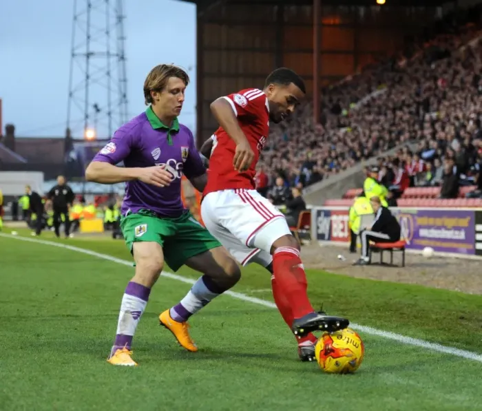 Framed Print : Bristol City's Luke Freeman Chases Down Swindon Town's Nathan Byrne in Sky Bet League One Clash