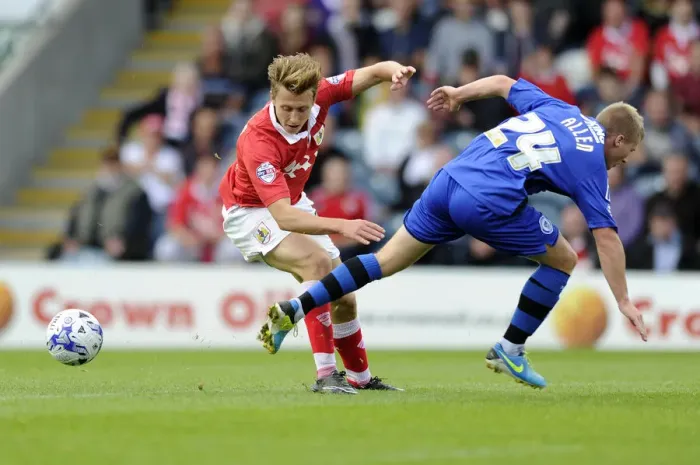 Framed Print : Bristol City's Luke Freeman Evades Rochdale's Jamie Allen during Sky Bet League One Clash
