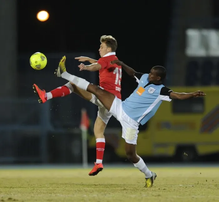 Framed Print : Bristol City's Luke Freeman Faces Off Against Botswana Defender During Pre-Season Tour Framed Print : Bristol City's Luke Freeman Faces Off Against Botswana Defender During Pre-Season Tour