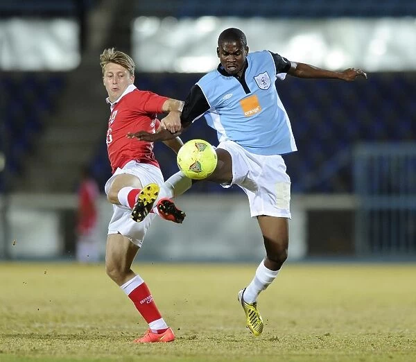 Bristol City's Luke Freeman Faces Off Against Mosha Gaolaolwe of Botswana in Pre-Season Friendly