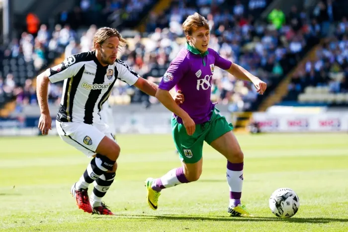 Framed Print : Bristol City's Luke Freeman Faces Off Against Notts County's Alan Smith in Sky Bet League 1 Clash Framed Print : Bristol City's Luke Freeman Faces Off Against Notts County's Alan Smith in Sky Bet League 1 Clash
