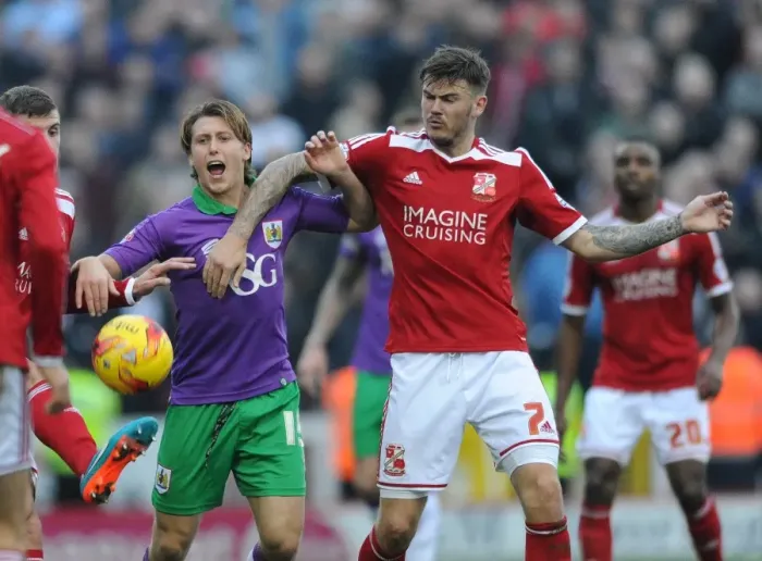Framed Print : Bristol City's Luke Freeman Fouled by Swindon Town's Ben Gladwin during Swindon Town vs. Bristol City, Sky Bet League One Match Framed Print : Bristol City's Luke Freeman Fouled by Swindon Town's Ben Gladwin during Swindon Town vs. Bristol City, Sky Bet League One Match
