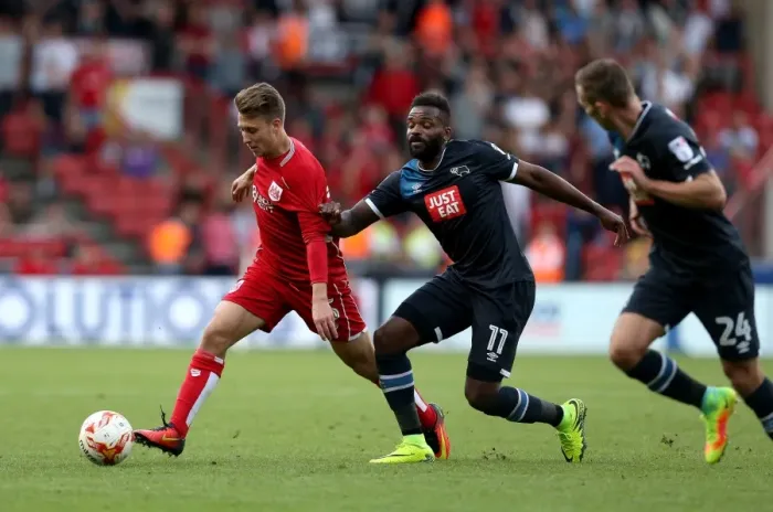 Framed Print : Bristol City's Luke Freeman Outmaneuvers Darren Bent of Derby County during Sky Bet Championship Match