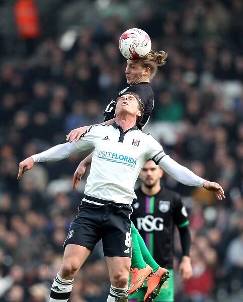 Bristol City's Luke Freeman Outmuscles Fulham's Scott Parker for a Header in Sky Bet Championship Clash