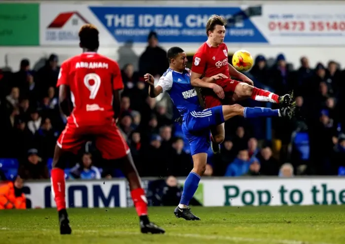 Framed Print : Bristol City's Luke Freeman Outmuscles Ipswich Town's Myles Kenlock for the Ball Framed Print : Bristol City's Luke Freeman Outmuscles Ipswich Town's Myles Kenlock for the Ball