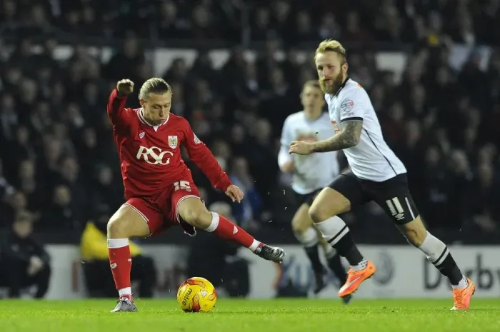 Framed Print : Bristol City's Luke Freeman Readies for Shot Against Derby County Framed Print : Bristol City's Luke Freeman Readies for Shot Against Derby County