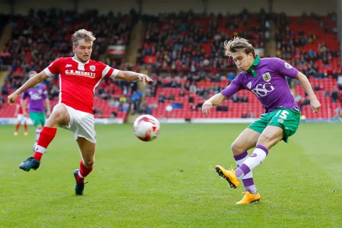 Framed Print : Bristol City's Luke Freeman Sends a Cross Past Barnsley's Luke Berry during the Sky Bet League 1 Match Framed Print : Bristol City's Luke Freeman Sends a Cross Past Barnsley's Luke Berry during the Sky Bet League 1 Match