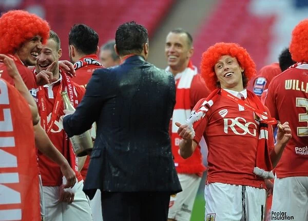 Bristol City's Luke Freeman Shares a Laugh with Steve Cotterill after JPT Final Victory Champagne Soaking