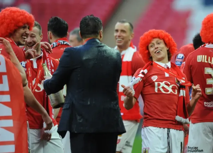 Framed Print : Bristol City's Luke Freeman Shares a Laugh with Steve Cotterill after JPT Final Victory Champagne Soaking