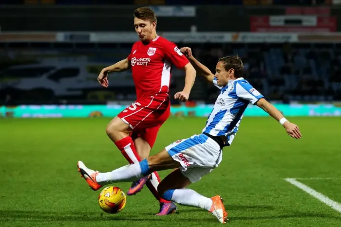 Framed Print : Bristol City's Luke Freeman Tackled by Huddersfield Town Player during Sky Bet Championship Match