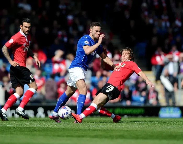 Framed Print : Bristol City's Luke Freeman Tackles Gary Roberts in Chesterfield Showdown