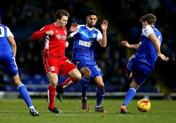Bristol City's Luke Freeman Tackles Ipswich Town's Christophe Berra in Championship Clash