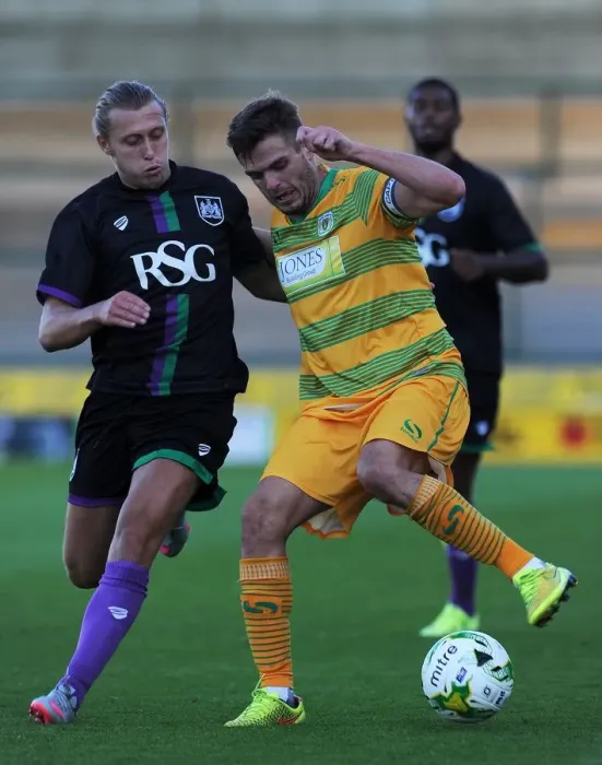 Framed Print : Bristol City's Luke Freeman Tackles Yeovil Town's Ryan Dickson in Pre-Season Clash Framed Print : Bristol City's Luke Freeman Tackles Yeovil Town's Ryan Dickson in Pre-Season Clash