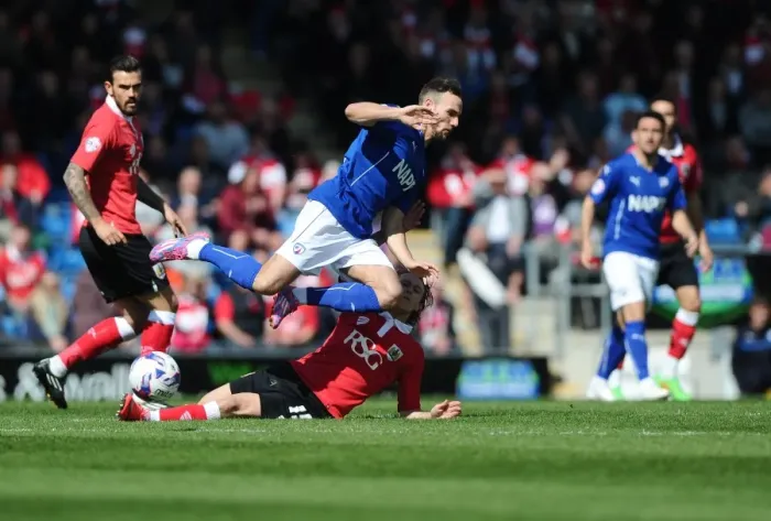 Framed Print : Bristol City's Luke Freeman vs. Gary Roberts Tackle: Intense Moment from Chesterfield Showdown