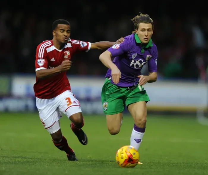 Framed Print : Bristol City's Luke Freeman vs Swindon Town's Nathan Byrne: Intense Battle in Swindon Town v Bristol City Football Match, Sky Bet League One Framed Print : Bristol City's Luke Freeman vs Swindon Town's Nathan Byrne: Intense Battle in Swindon Town v Bristol City Football Match, Sky Bet League One