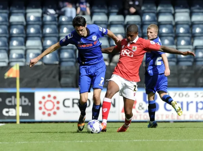 Framed Print : Bristol City's Mark Little and Rochdale's Peter Vincenti Battle for Ball Possession in Sky Bet League One Clash Framed Print : Bristol City's Mark Little and Rochdale's Peter Vincenti Battle for Ball Possession in Sky Bet League One Clash